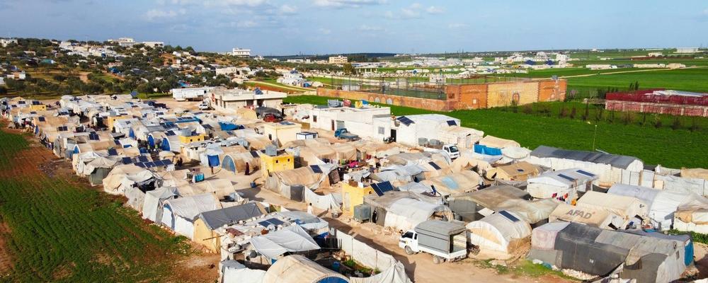People living in a refugee camp in Syria